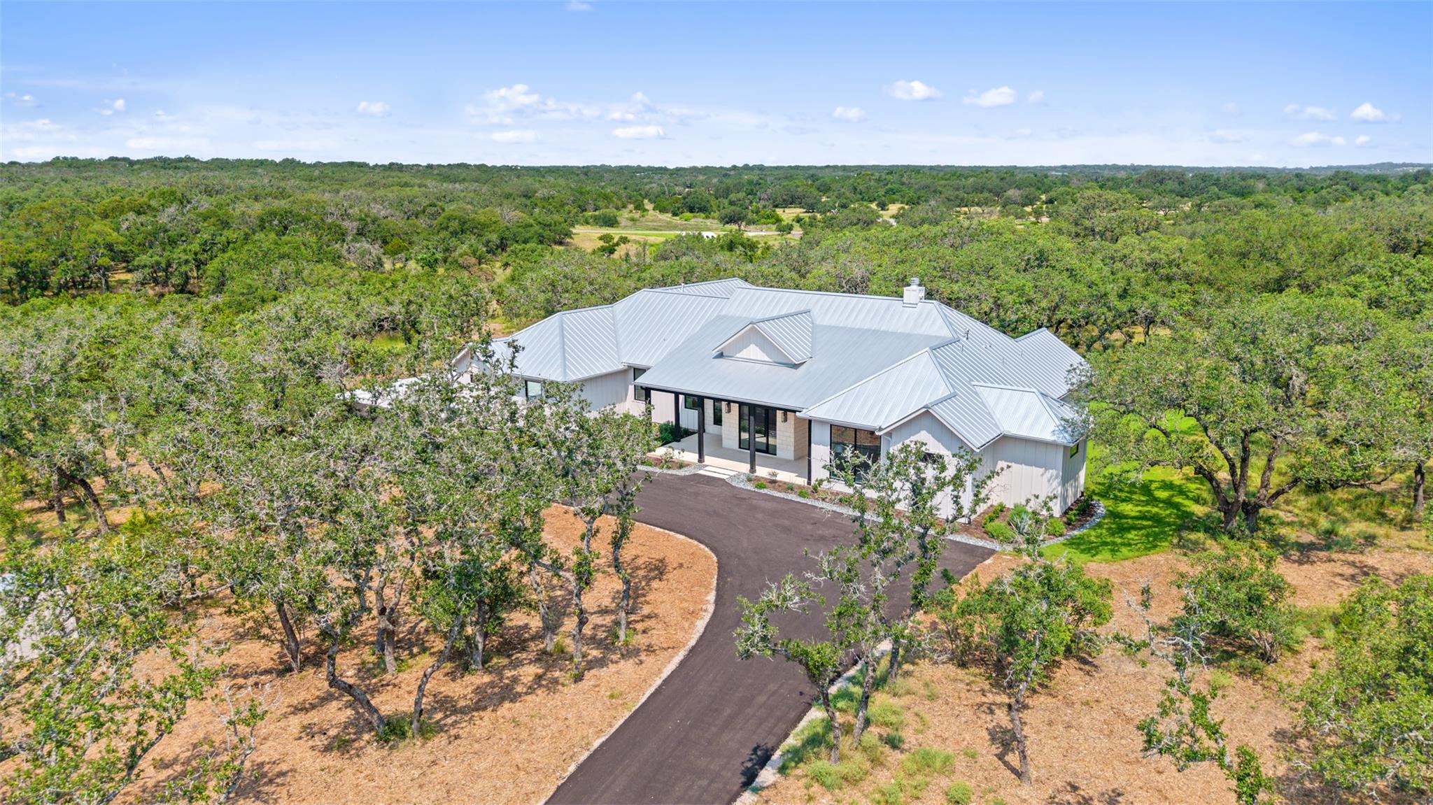 172 Crooked Creek, Johnson City, TX 78636 — photo 1