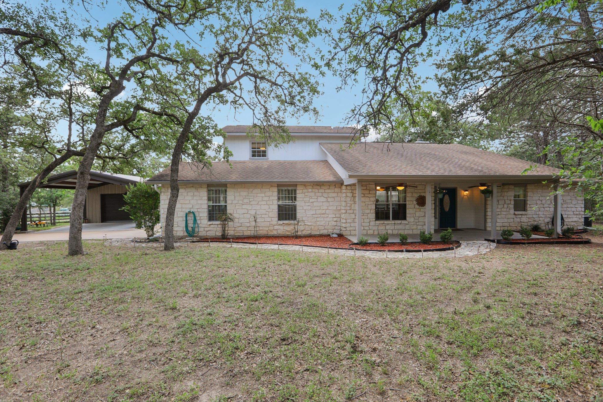 148 Oak Ridge, Cedar Creek, TX 78612 — photo 1