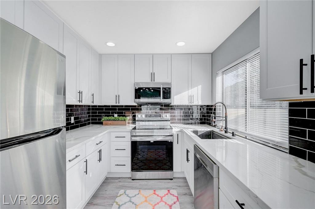 1040  Neil Armstrong Circle, Las Vegas, NV 89145 — photo 1
