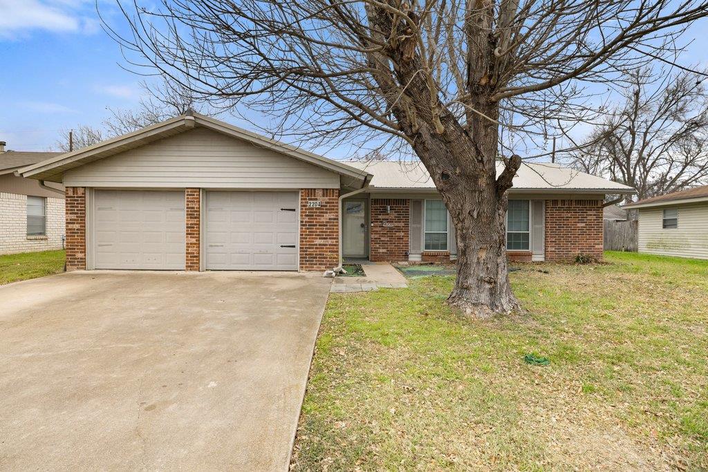 2204 Smith, Taylor, TX 76574 — photo 1