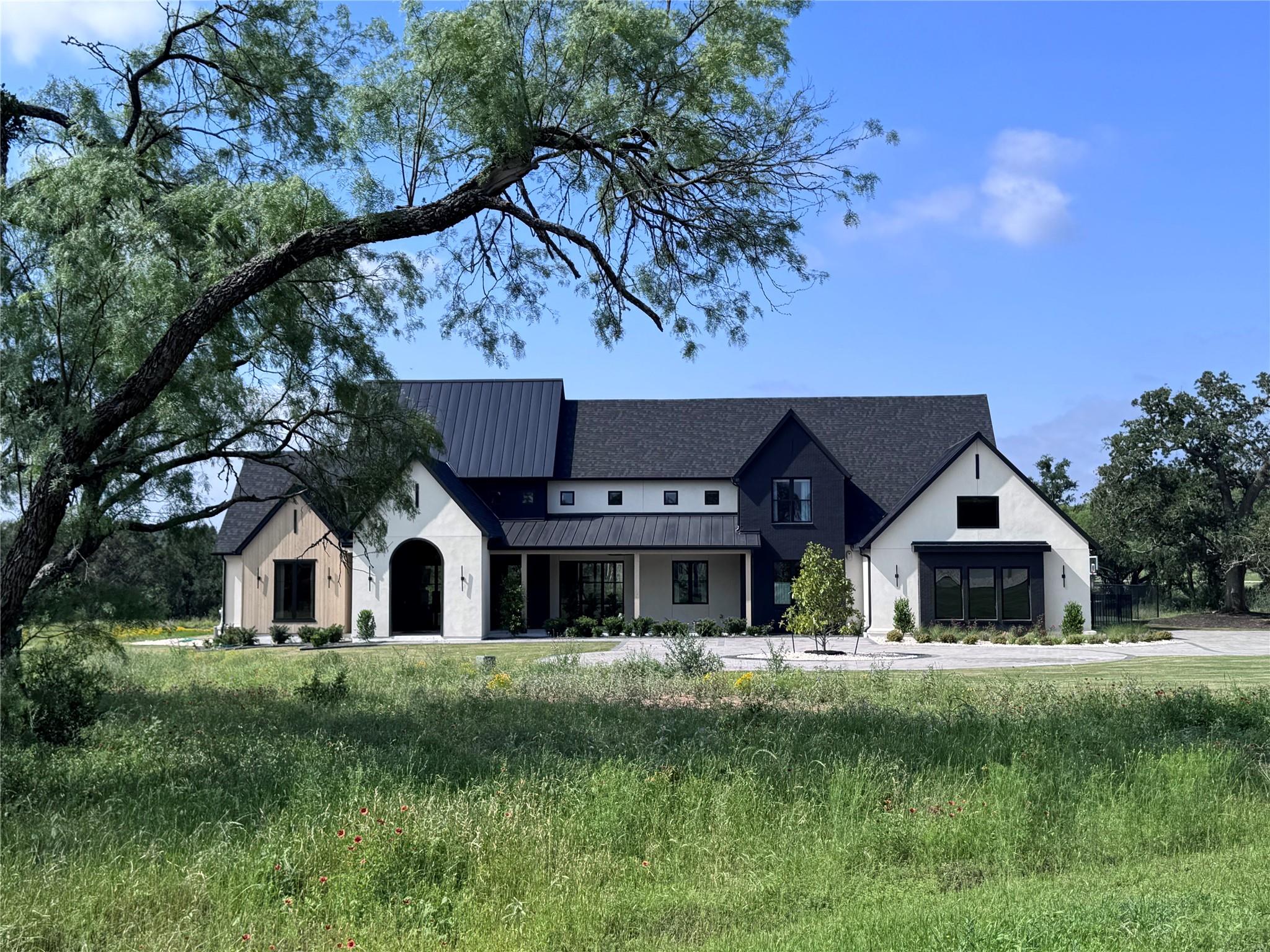 250 Hawthorne, Spicewood, TX 78669 — photo 1
