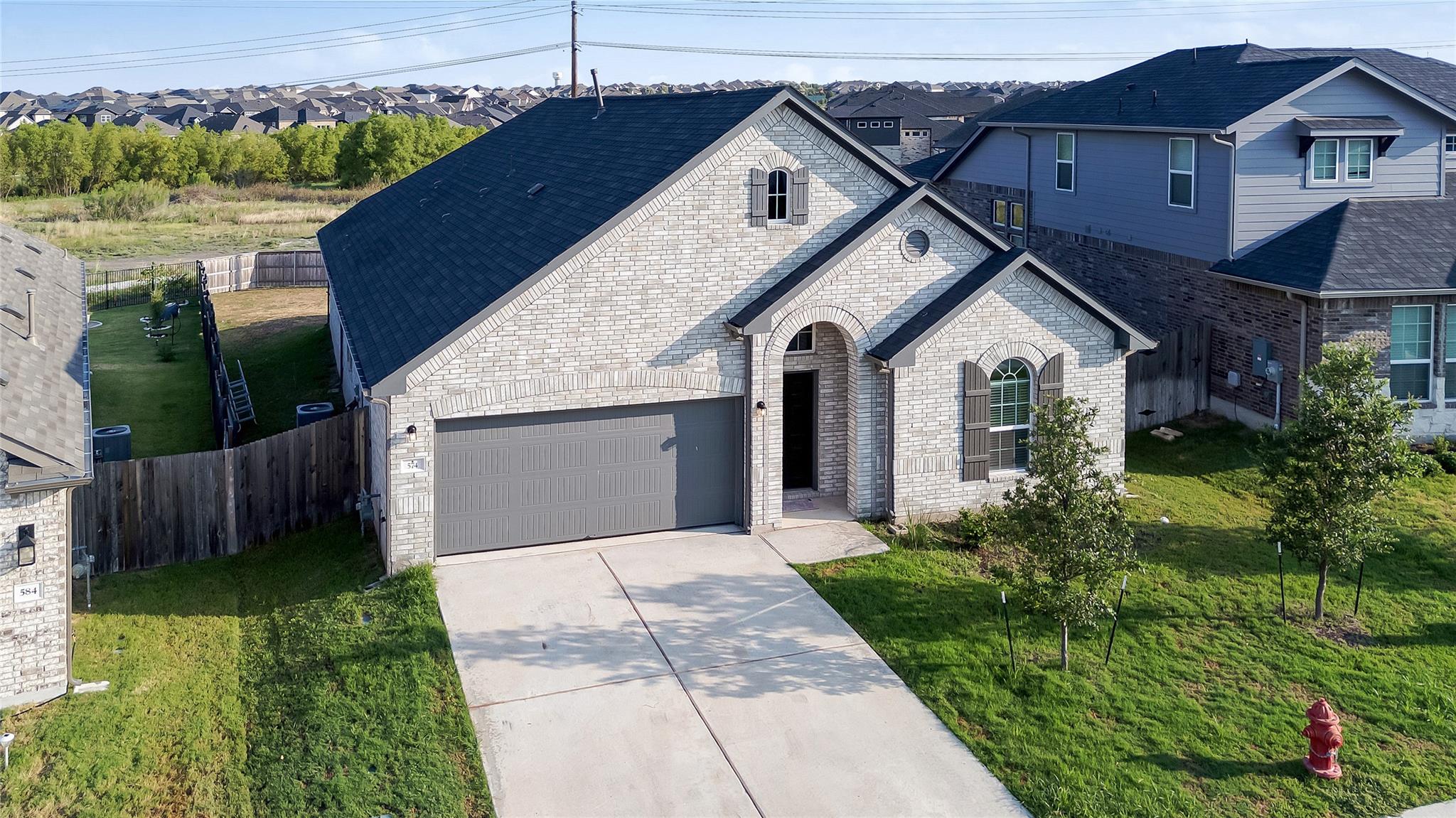 574  Sugar Cane Rd, Buda, TX 78610 — photo 1