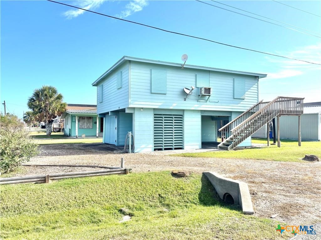411 W Olive Avenue, Port O'Connor, TX 77982 — photo 1
