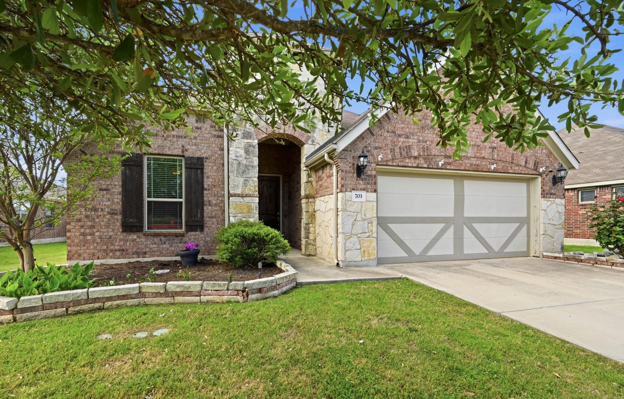 703 Emory, Hutto, TX 78634 — photo 1