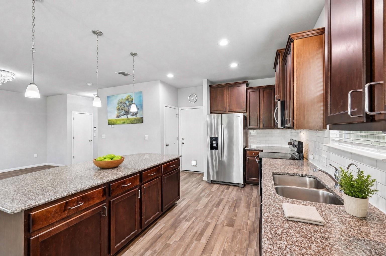 387 Guemal, Buda, TX 78610 — photo 1