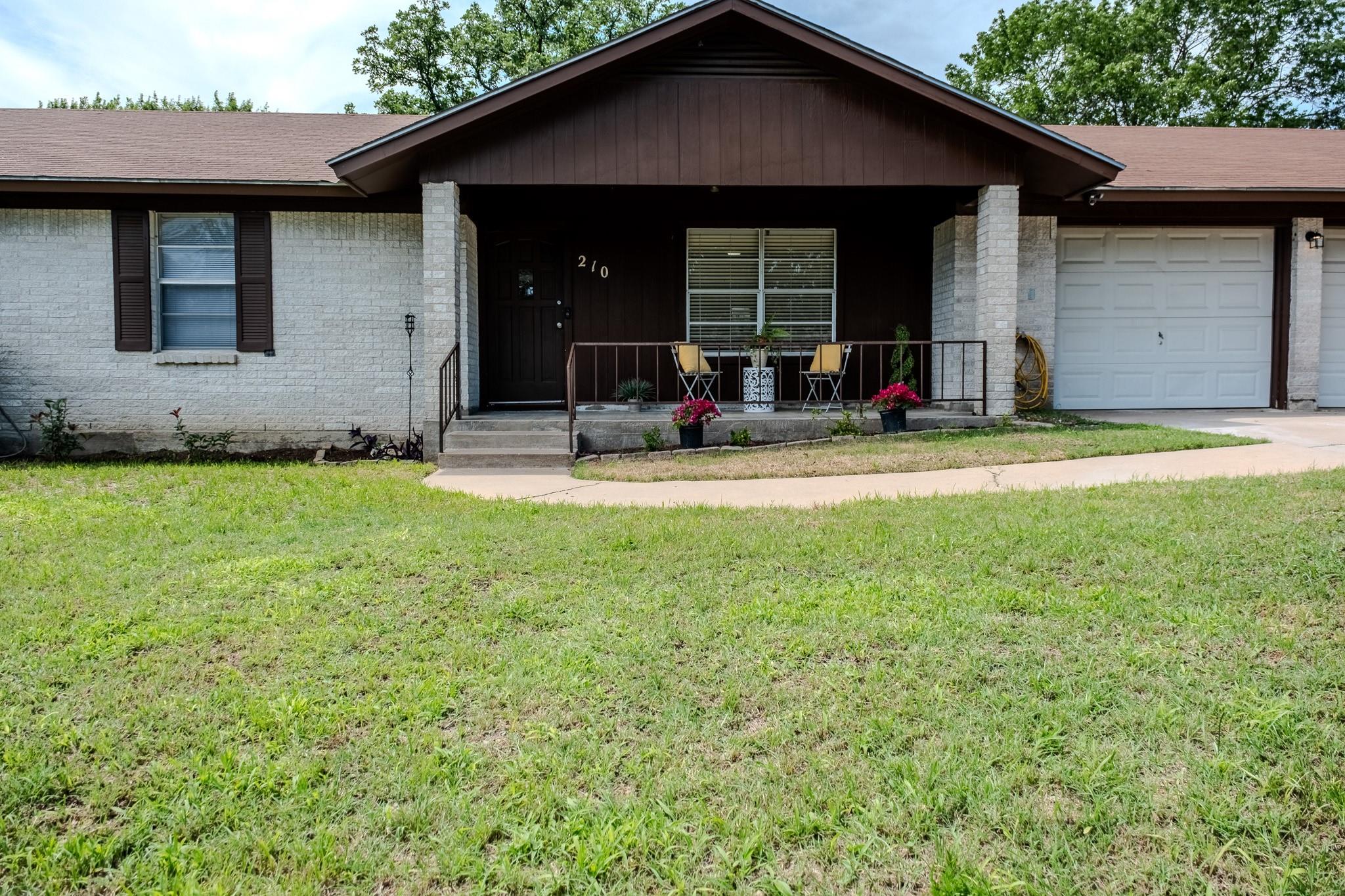 210  LOESCH Dr, Elgin, TX 78621 — photo 1