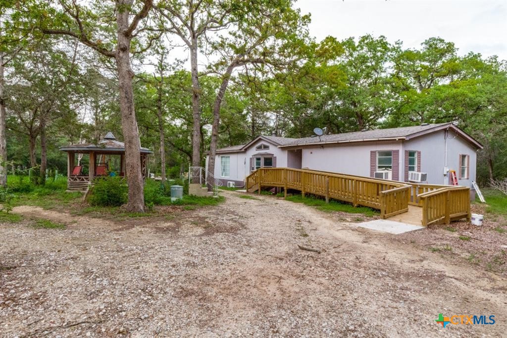 319 Green Oaks Drive, Bastrop, TX 78602 — photo 1