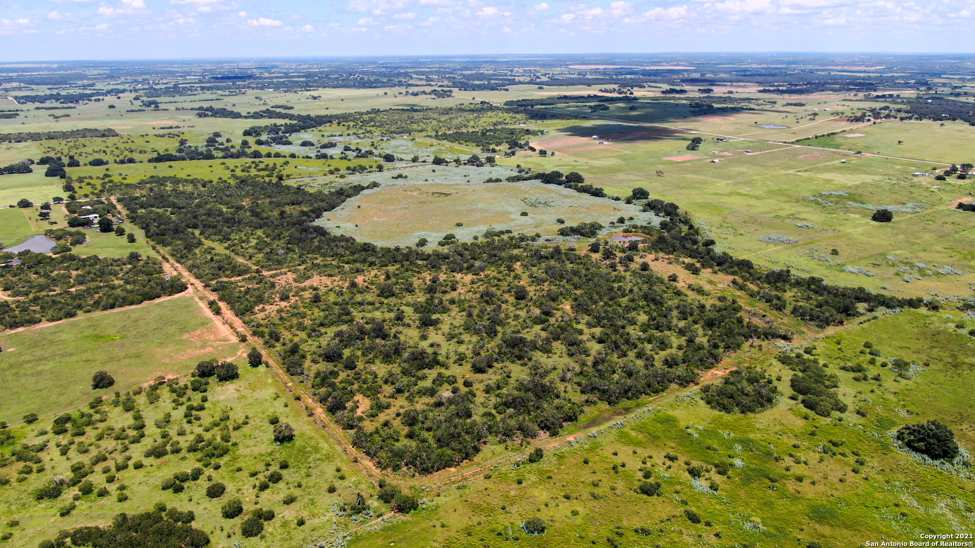 6032 COUNTY ROAD 405, Floresville, TX 78114 — photo 1