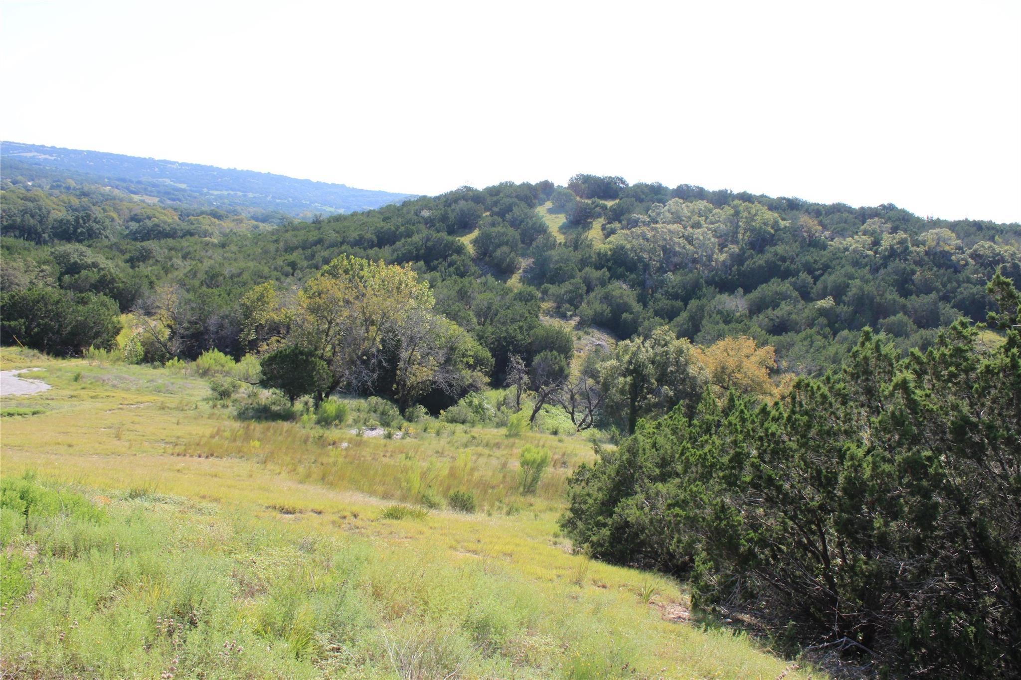 Lot 100  Saddle Ridge Dr, Bertram, TX 78605 — photo 1