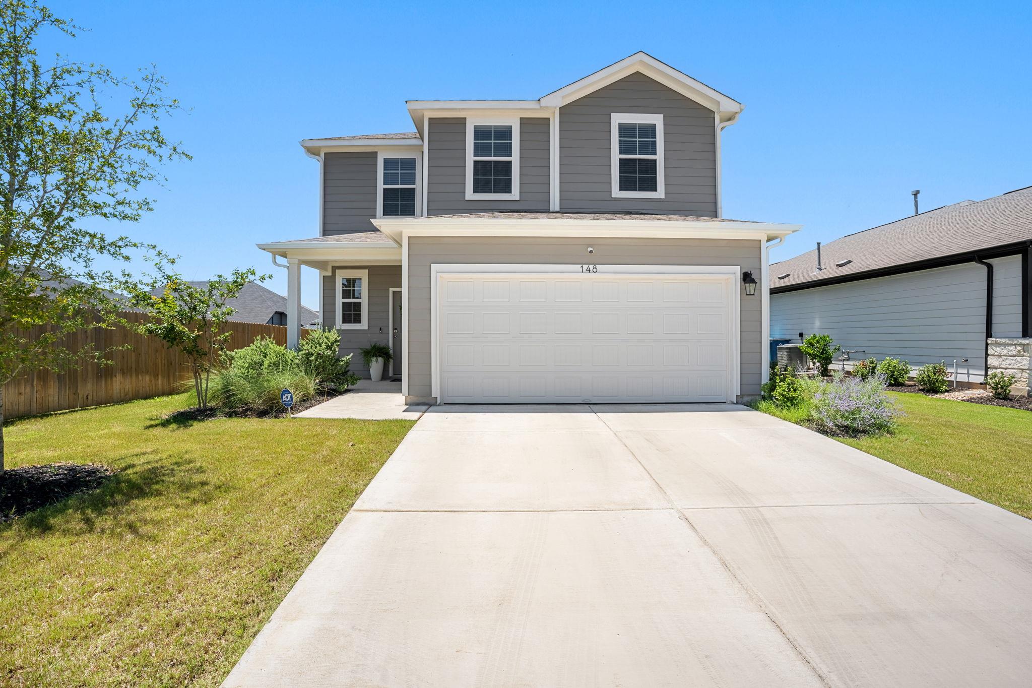 148  Hidalgo Ln, Elgin, TX 78621 — photo 1