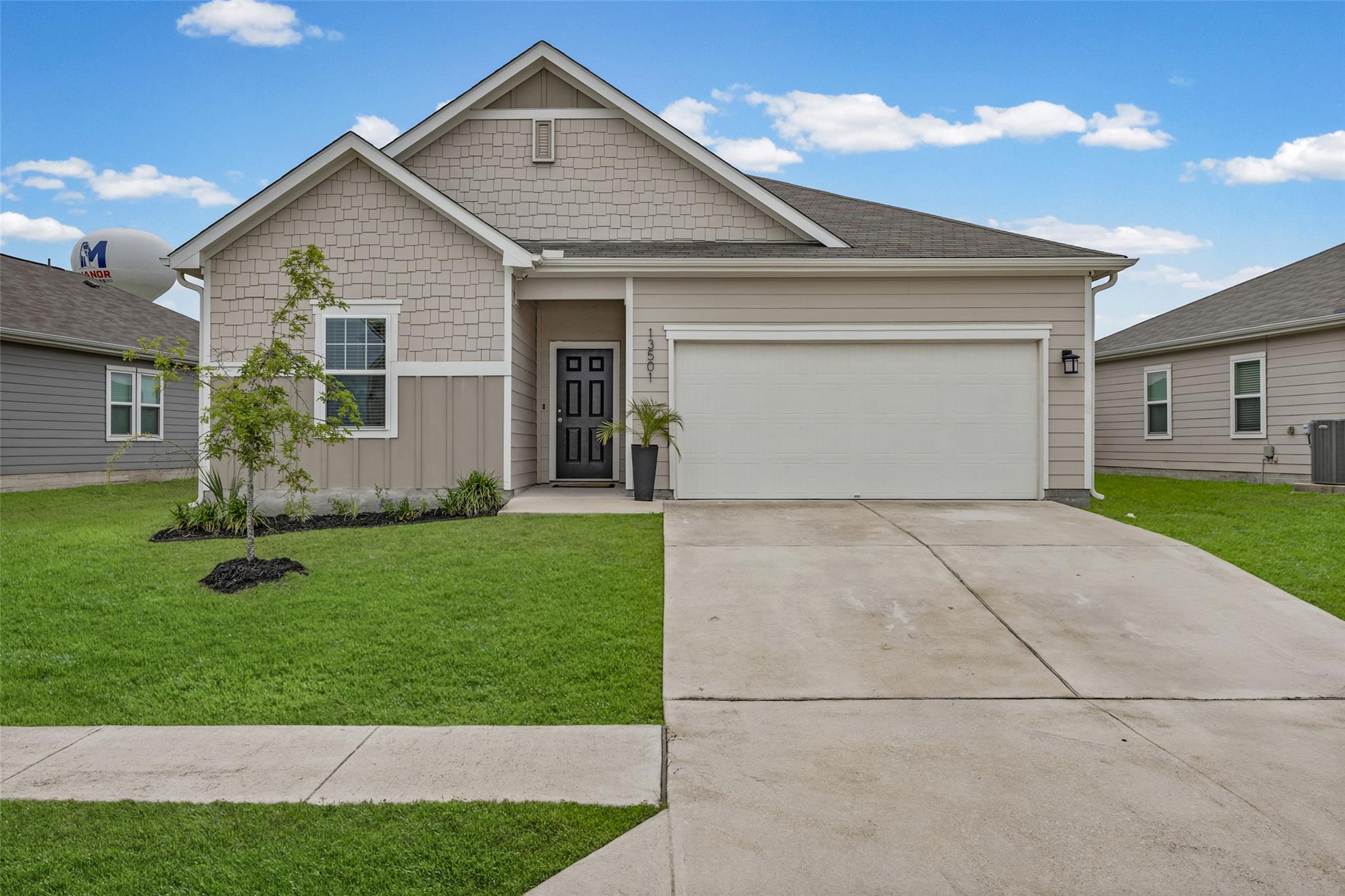 13501  Arthur Vandenburg Way, Manor, TX 78653 — photo 1