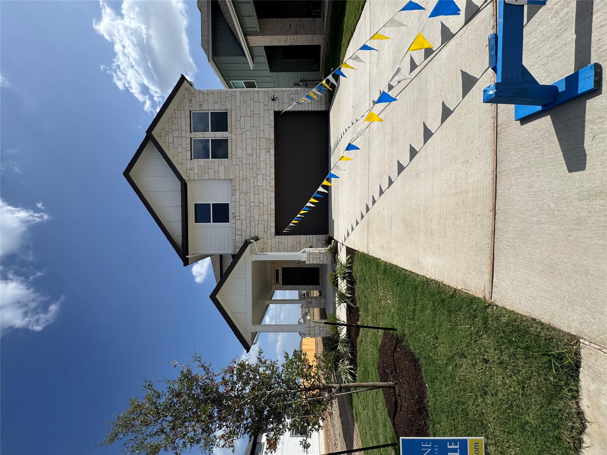 311 Young, Buda, TX 78610 — photo 1