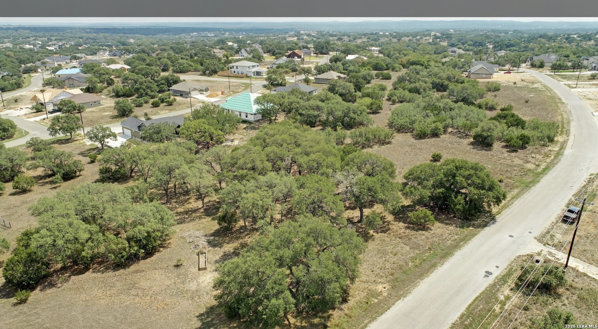107 S CALVIN BARRETT, Blanco, TX 78606 — photo 1
