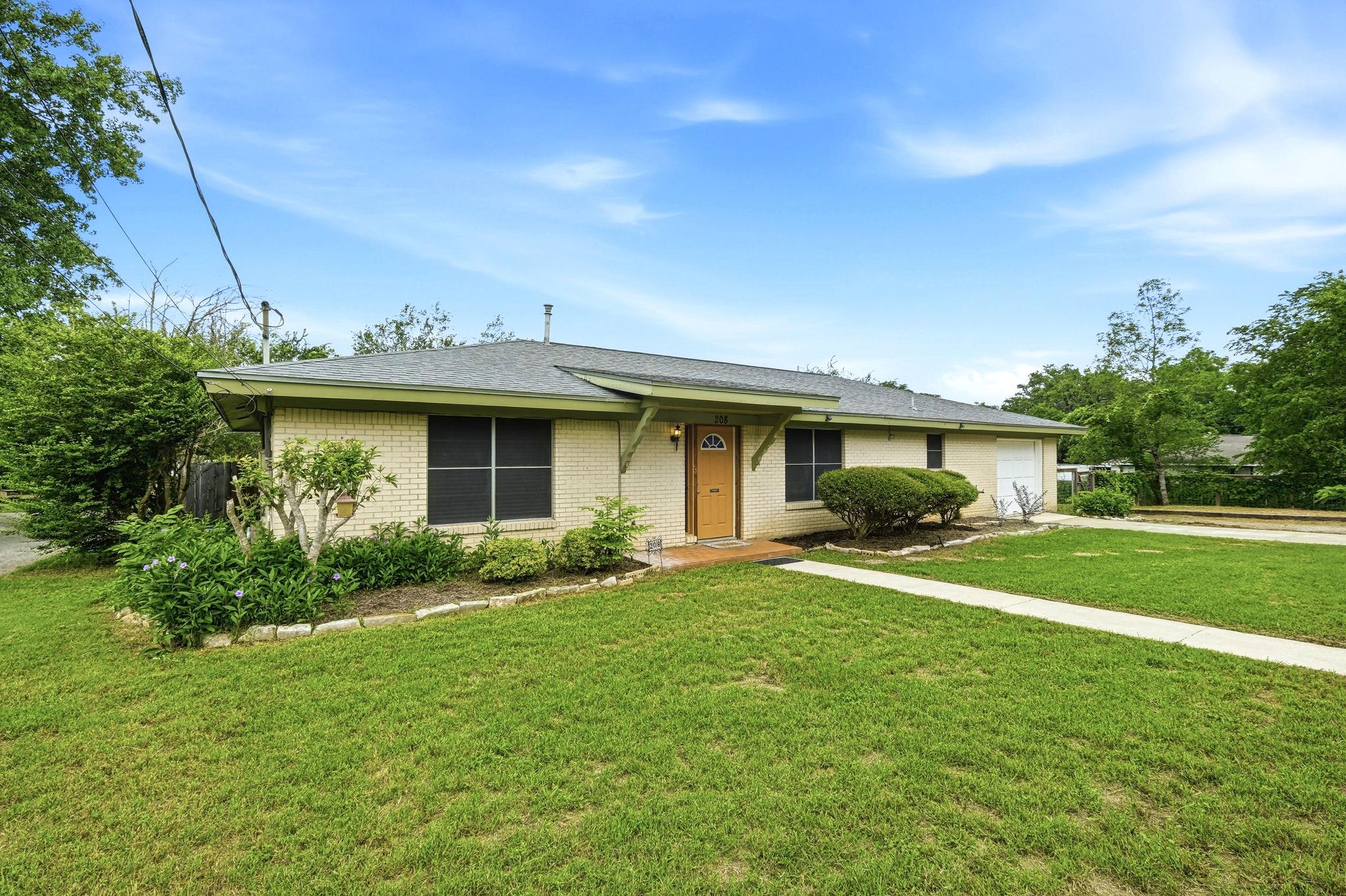 208 N Cedar, Buda, TX 78610 — photo 1