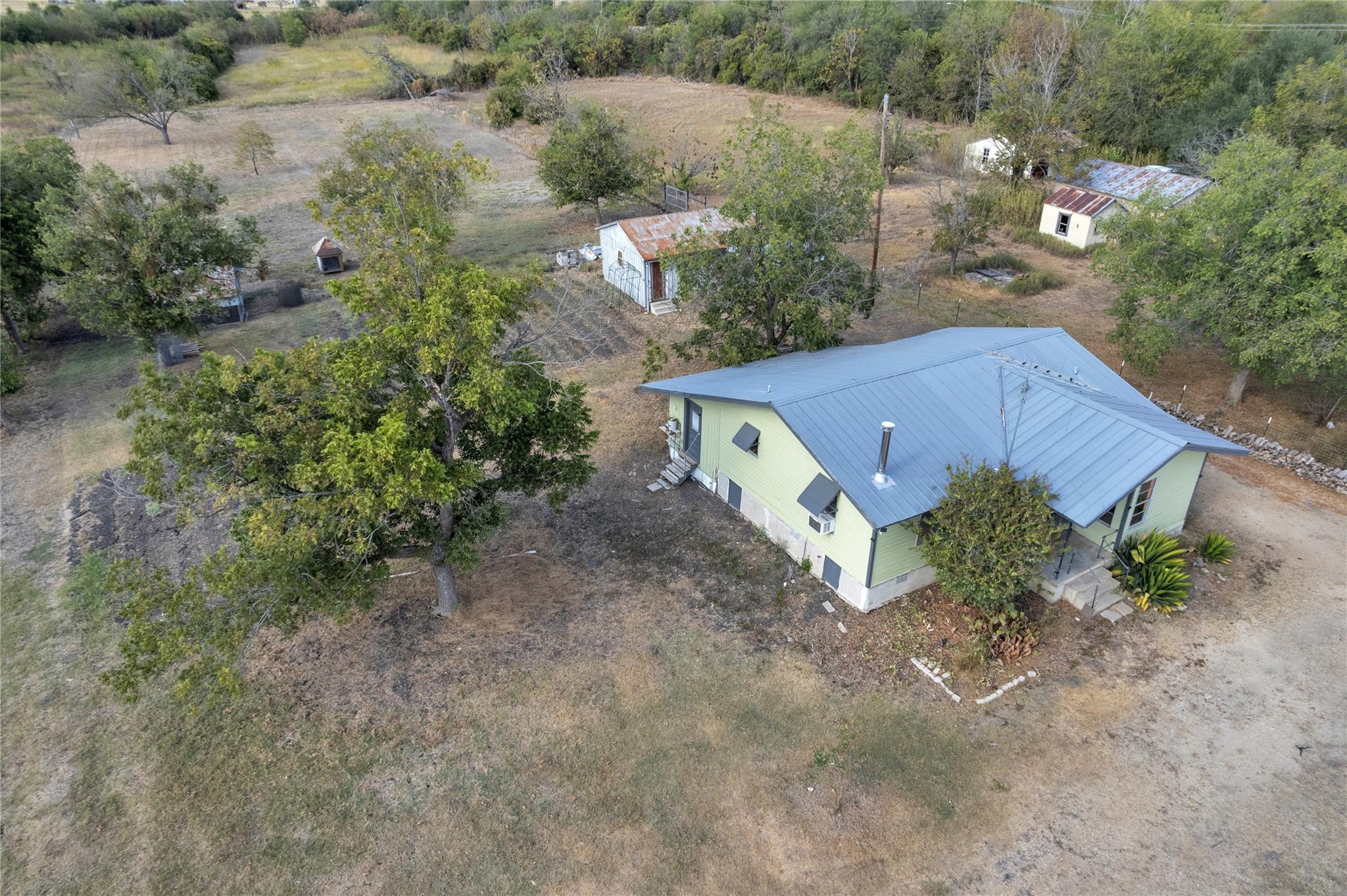 1607 E 4th St, Taylor, TX 76574 — photo 1