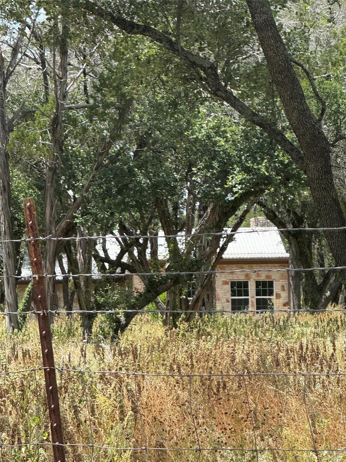 122 Winding Creek, Spicewood, TX 78669 — photo 1