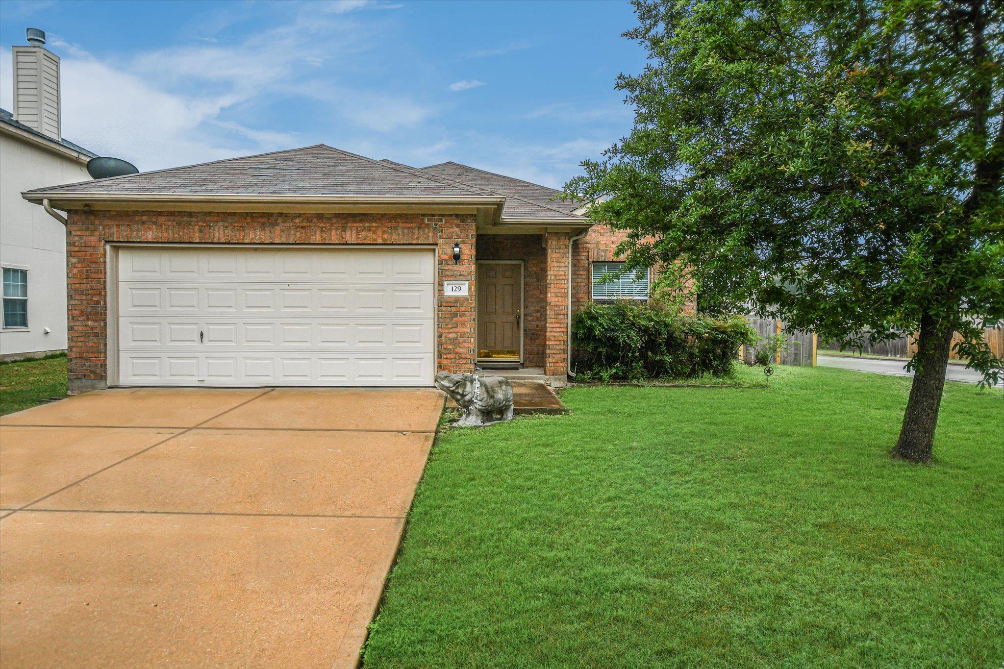 129 Almquist, Hutto, TX 78634 — photo 1