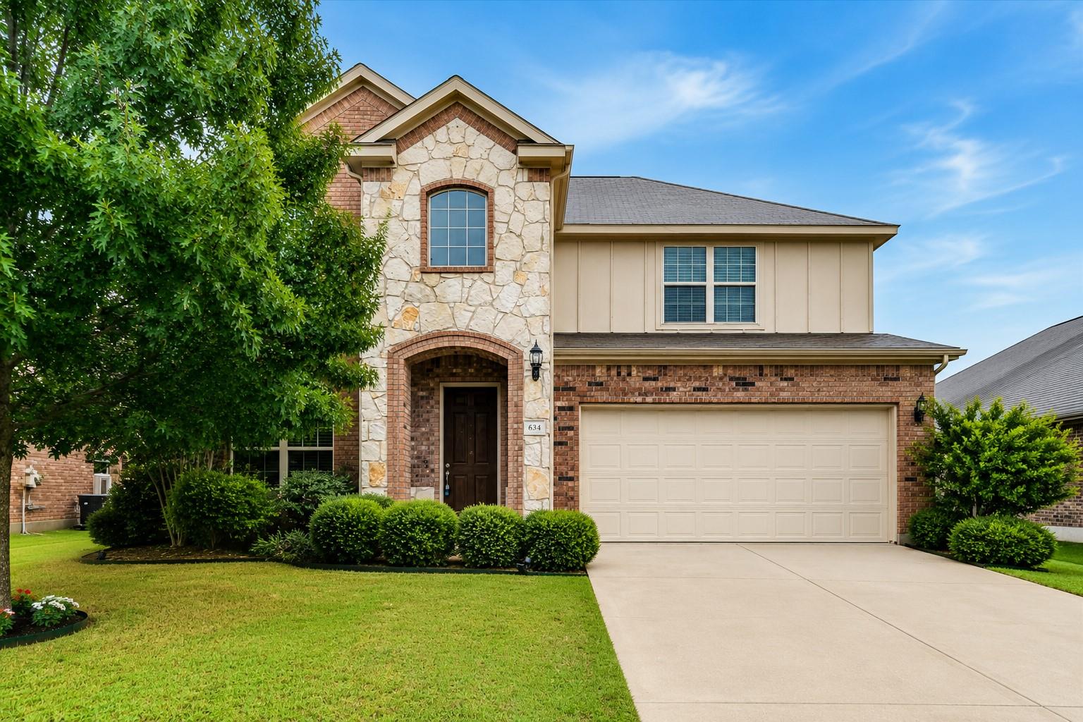 634 Blossom Valley, Buda, TX 78610 — photo 1