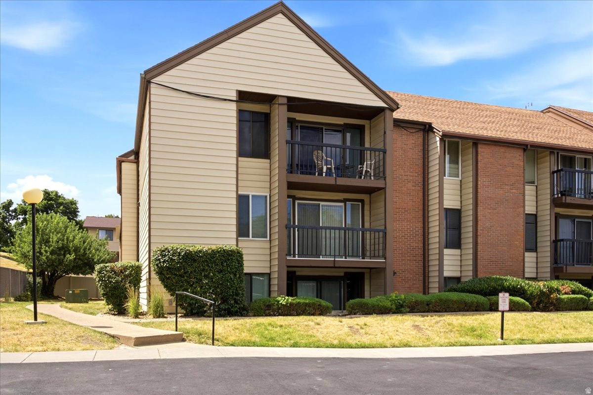1091 COUNTRY HILLS DRIVE #109, Ogden, UT 84403 — photo 1
