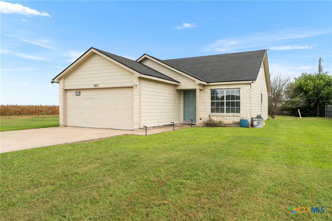 407 E Pietzsch Street, Bartlett, TX 76511 — photo 1