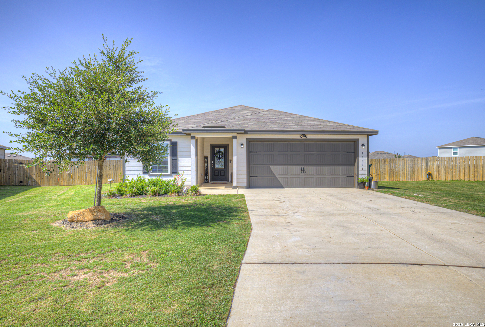16005 DICKENS BLF, Lytle, TX 78052 — photo 1
