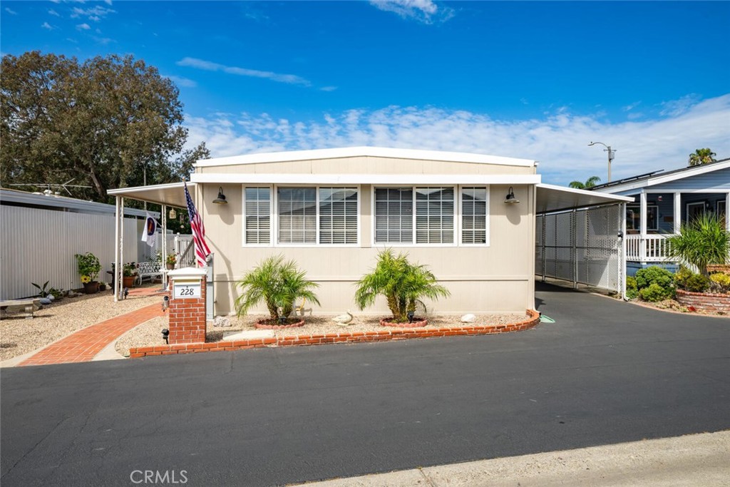 16222 Monterey Lane 228, Huntington Beach, CA 92649 — photo 1