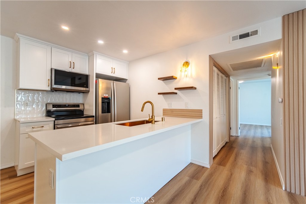 21951 Rimhurst Drive 202, Lake Forest, CA 92630 — photo 1