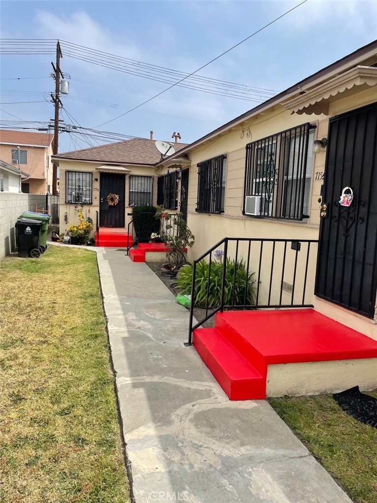 715 719 ½ W 78th, Los Angeles, CA 90044 — photo 1