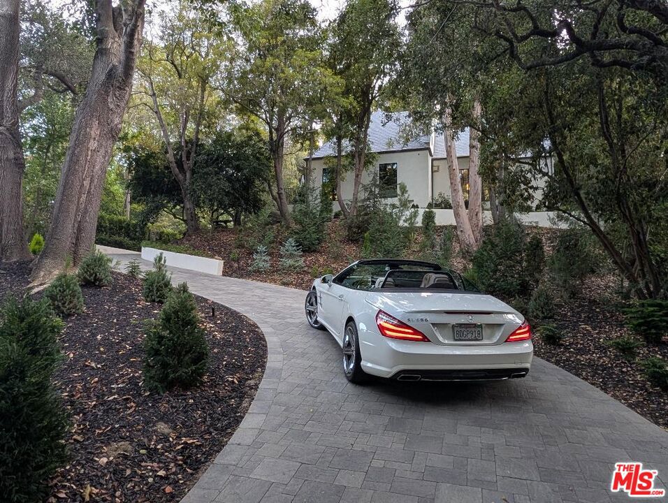 943 Moraga Drive, Los Angeles, CA 90049 — photo 1
