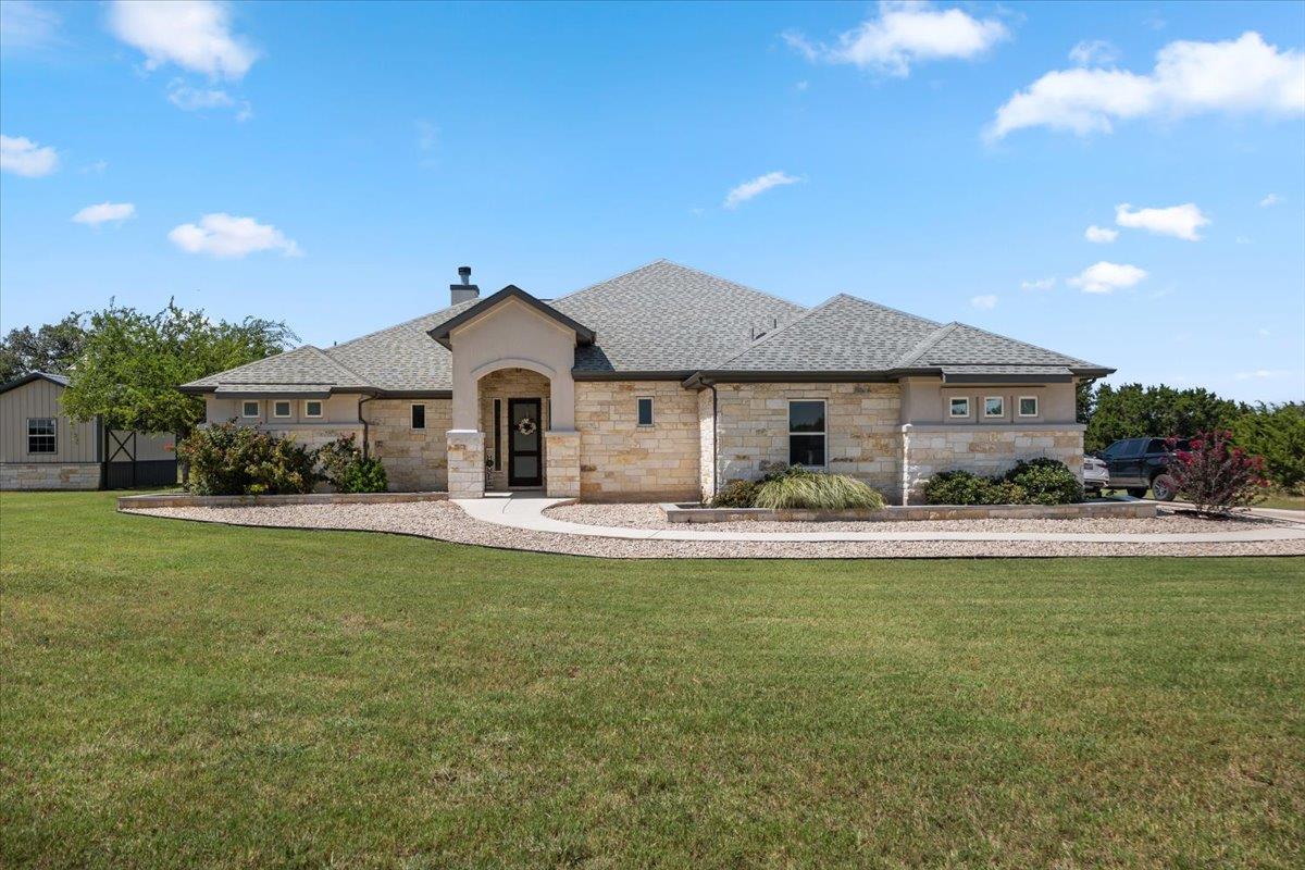 104 Draper, Bertram, TX 78605 — photo 1