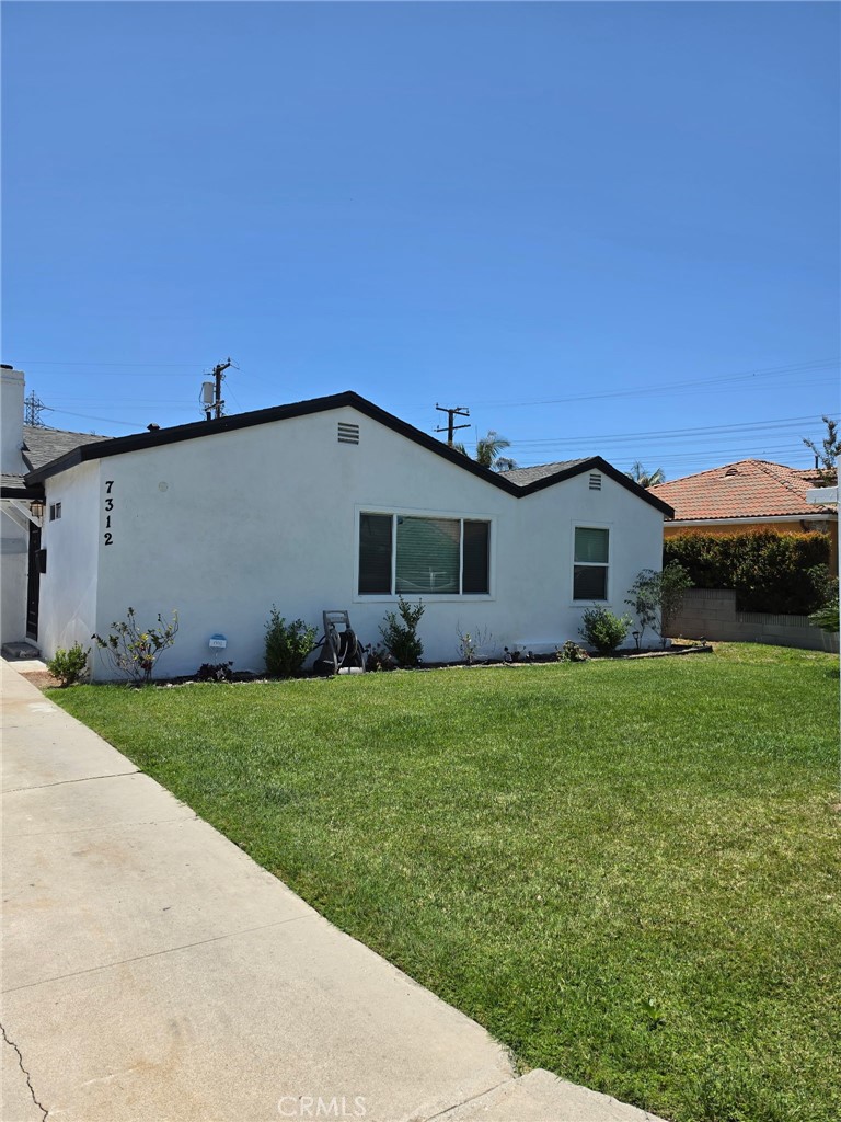 7312 Walnut Ave, Paramount, CA 90723 — photo 1