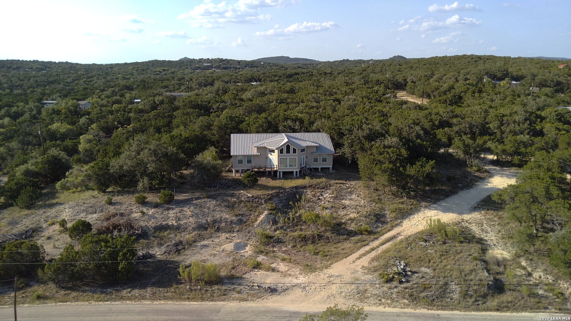 345 32ND ST E, Lakehills, TX 78063 — photo 1