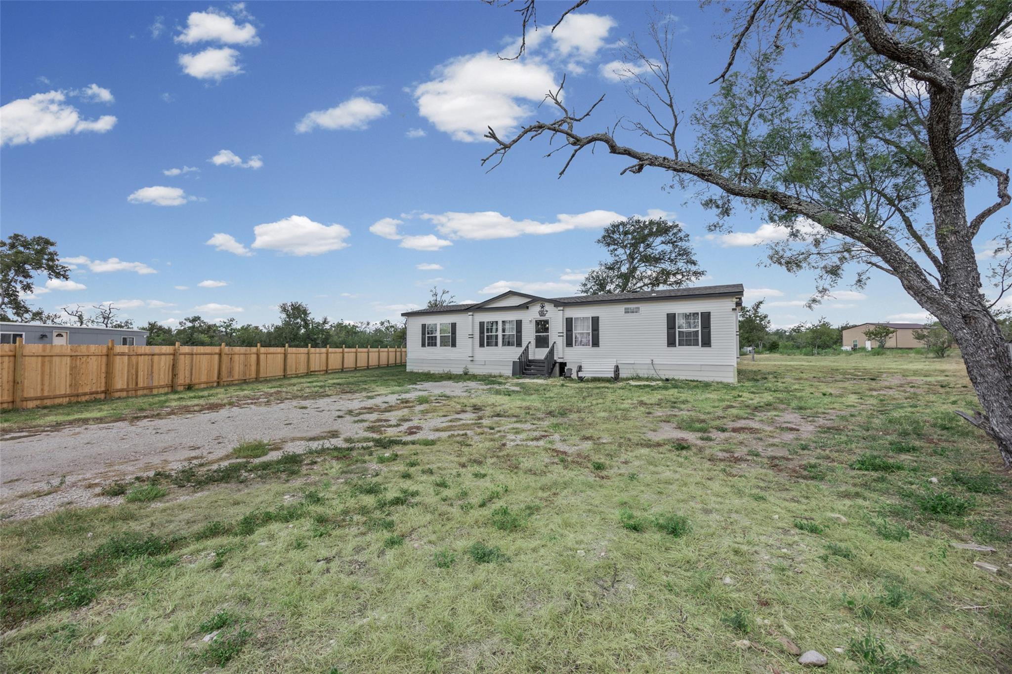 120 Mimosa, Dale, TX 78616 — photo 1