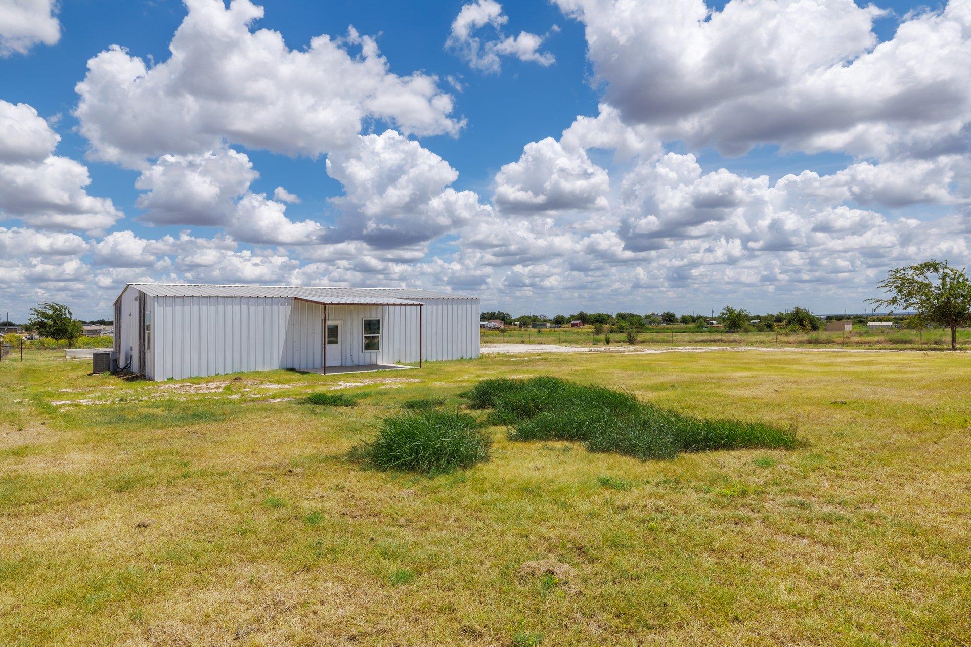 171 Daniel, Bertram, TX 78605 — photo 1