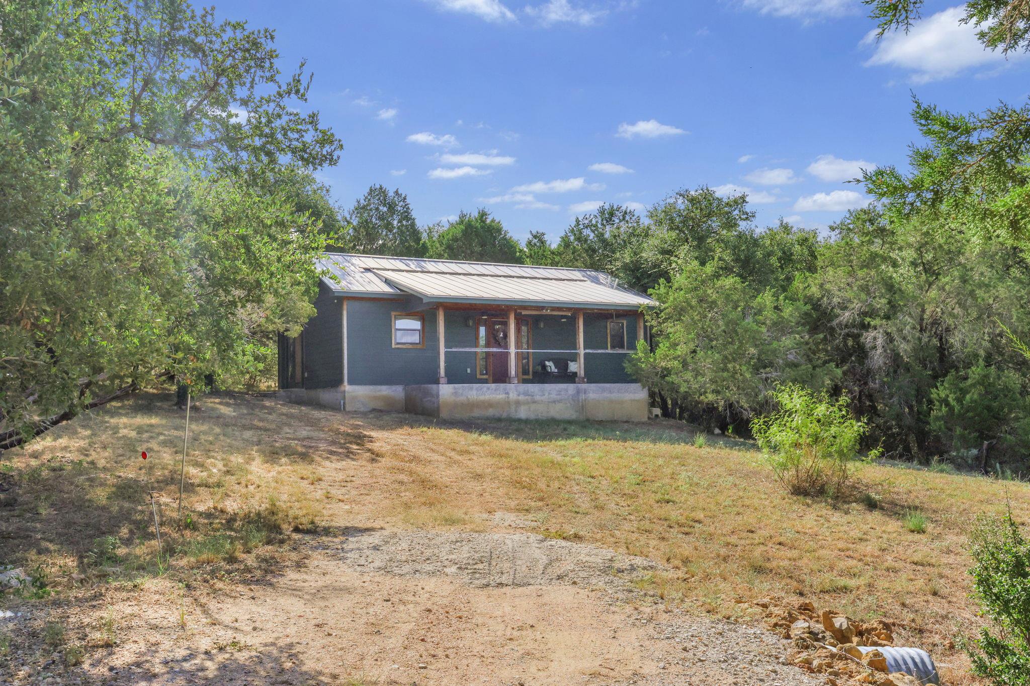 407 Breezing, Spicewood, TX 78669 — photo 1