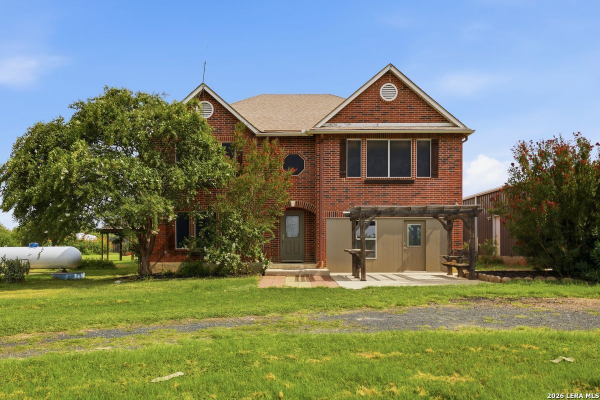 25 High Mdw, Lytle, TX 78052 — photo 1