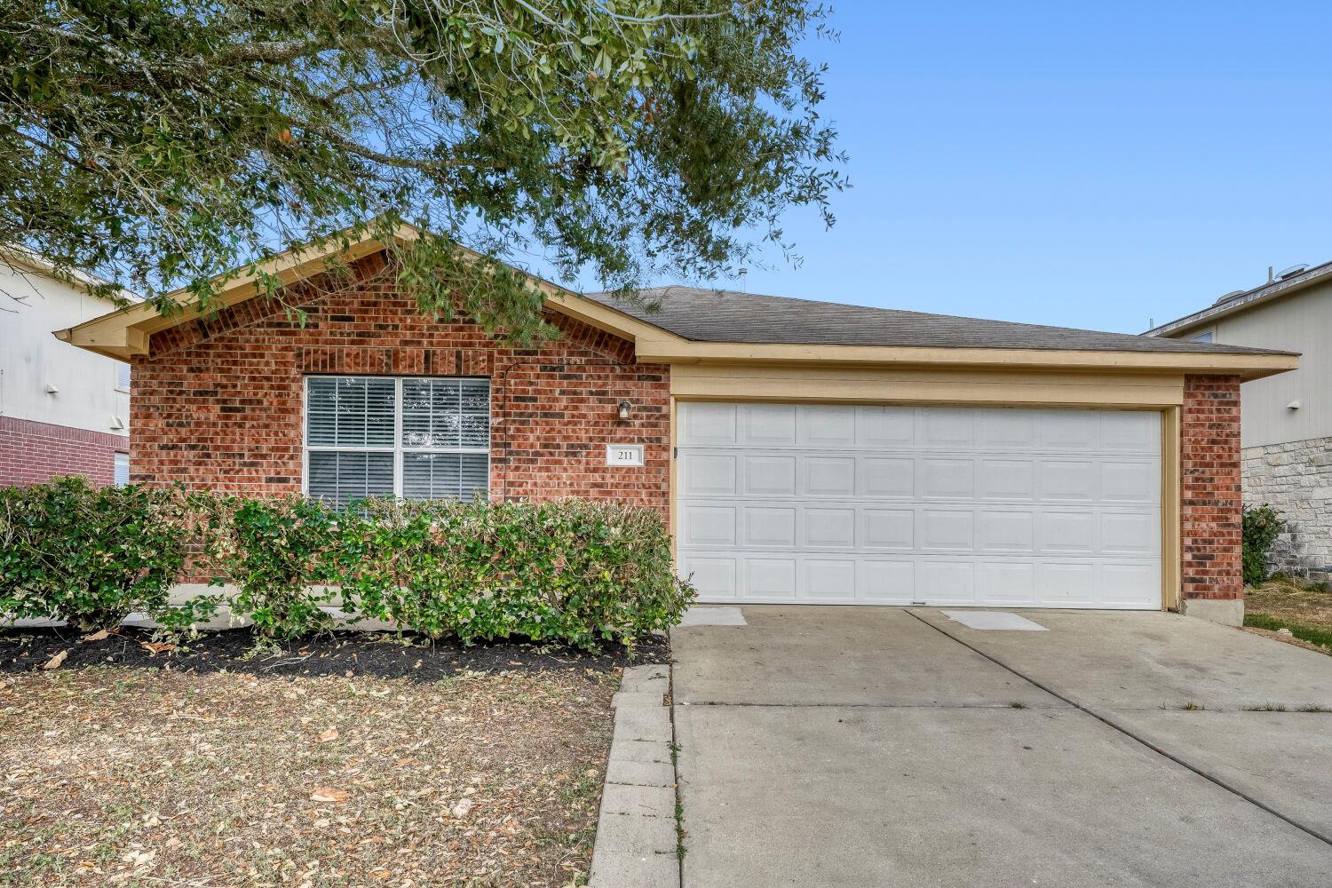 211 Remington, Bastrop, TX 78602 — photo 1