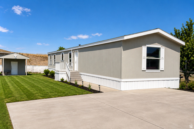 125  GREEN PINES AVE #D024, Tooele, UT 84074 — photo 1