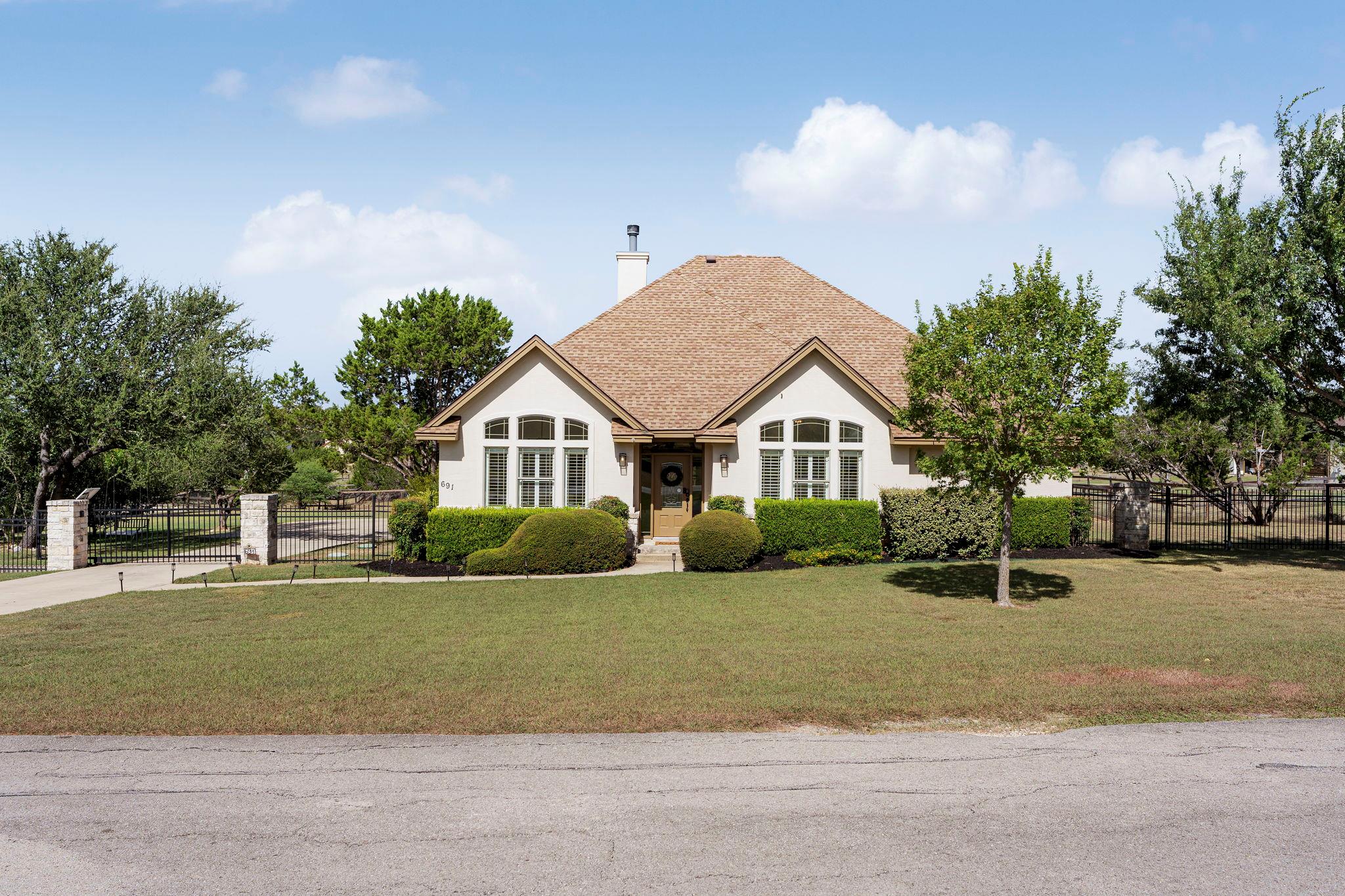 691 Broken Lance Dr, Dripping Springs, TX 78620 — photo 1