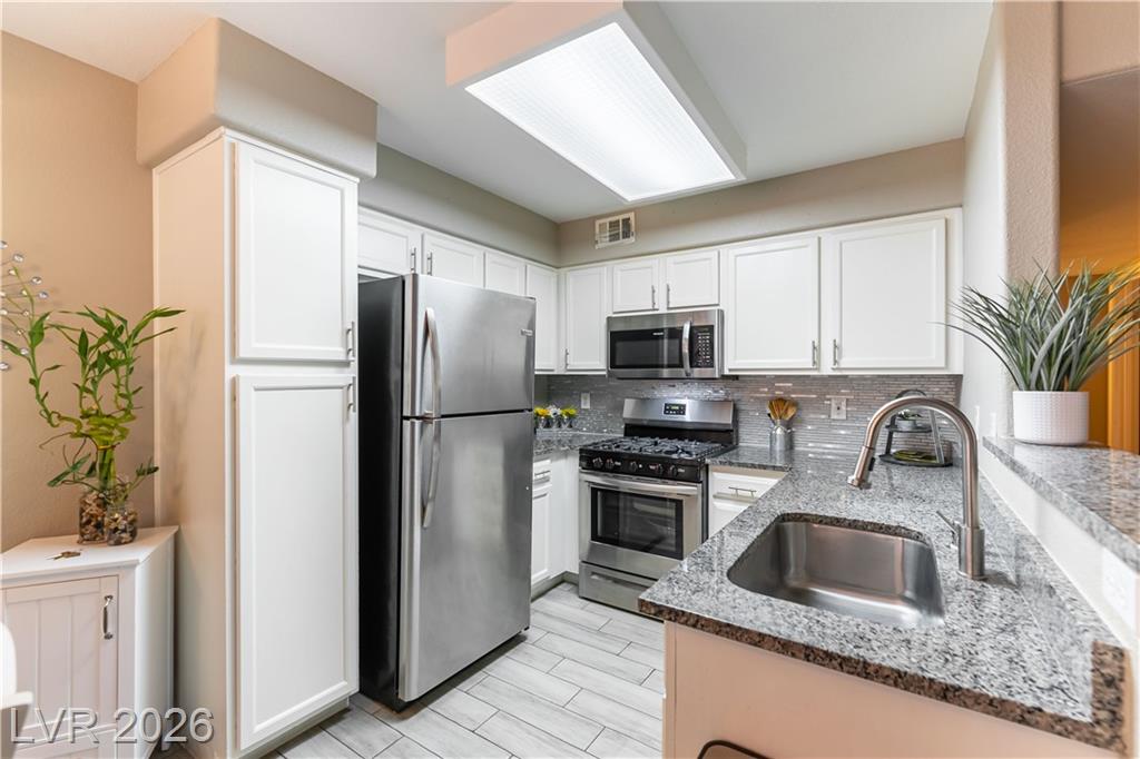 3174 Tarpon Drive 102, Las Vegas, NV 89120 — photo 1