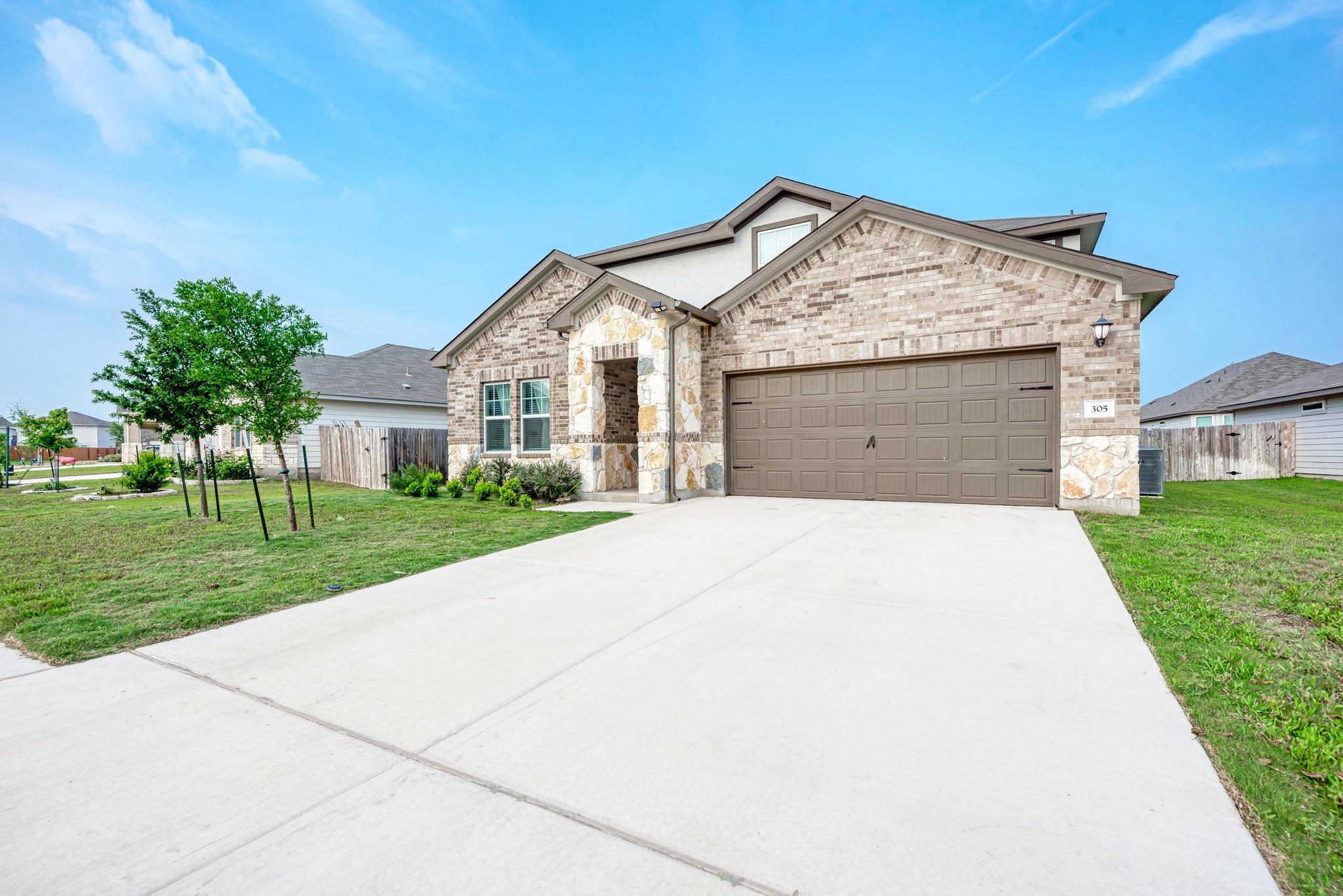 305  Windy Reed Rd, Hutto, TX 78634 — photo 1