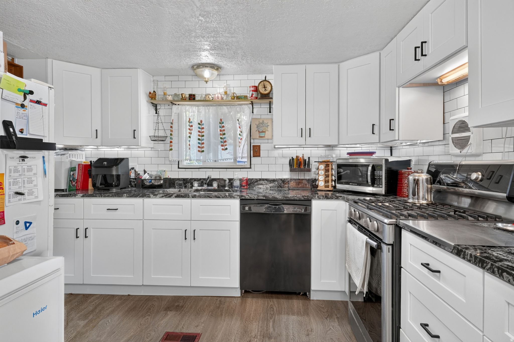 151 E HAMILTON LN, South Salt Lake, UT 84115 — photo 1