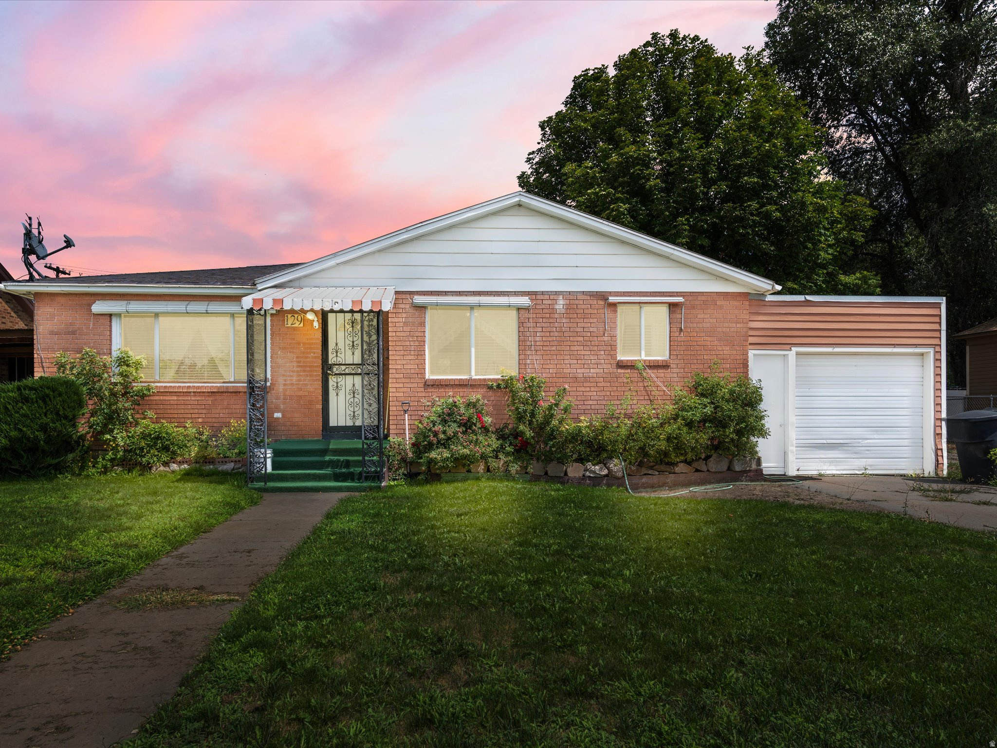 129 S MAIN ST, Malad City, ID 83252 — photo 1