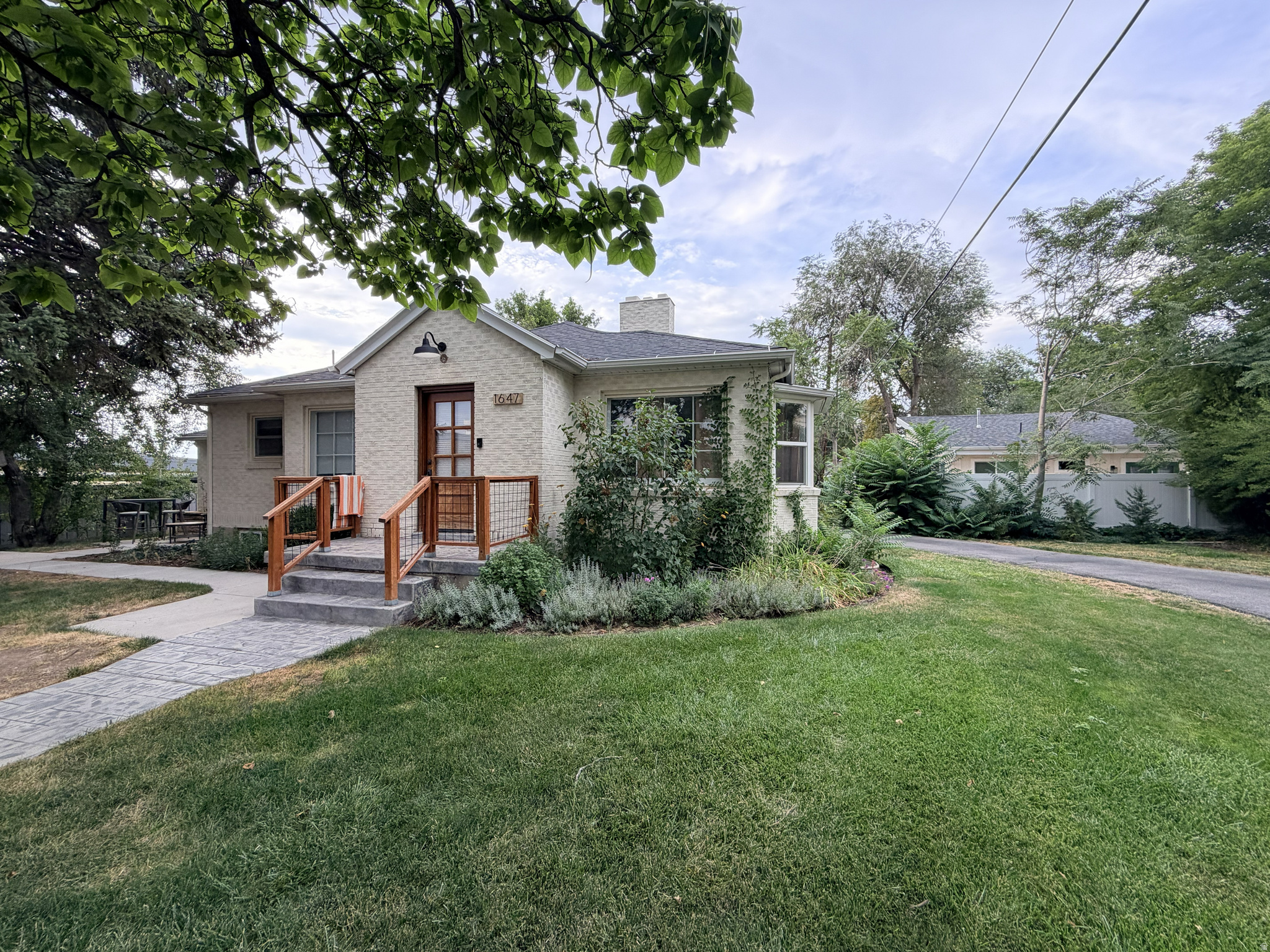 1647 E WOODLAND AVE, Millcreek, UT 84106 — photo 1