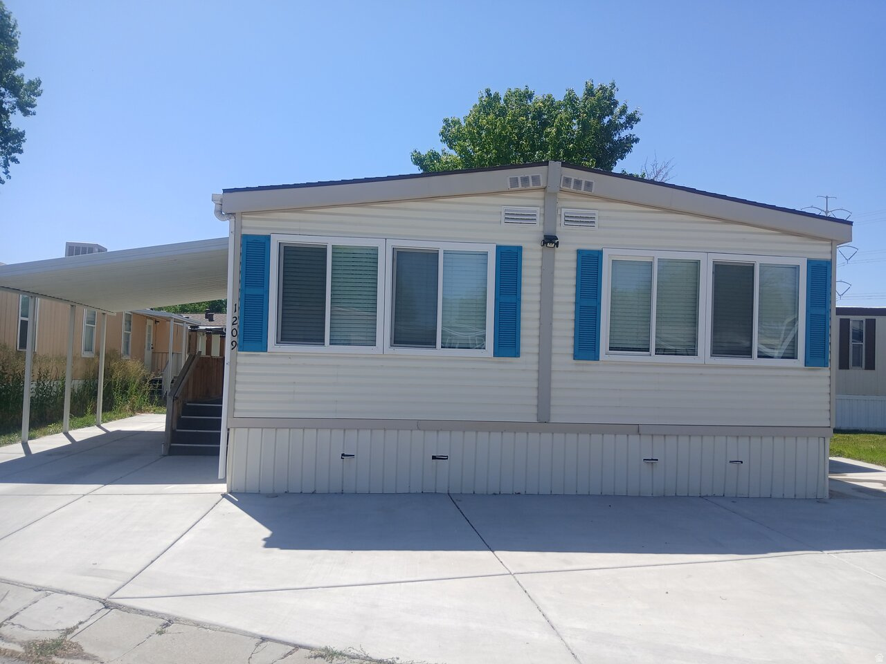 1209 W MEADOW STREAM RD #67, West Valley City, UT 84119 — photo 1