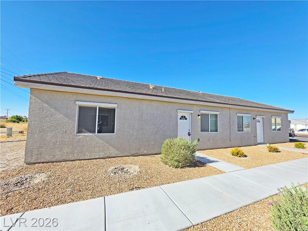 1121 Sixshooter Avenue 4, Pahrump, NV 89048 — photo 1