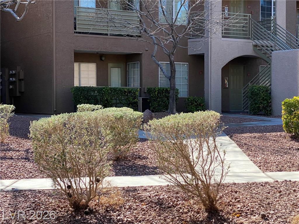 7720 SECRET SHORE Drive 106, Las Vegas, NV 89128 — photo 1