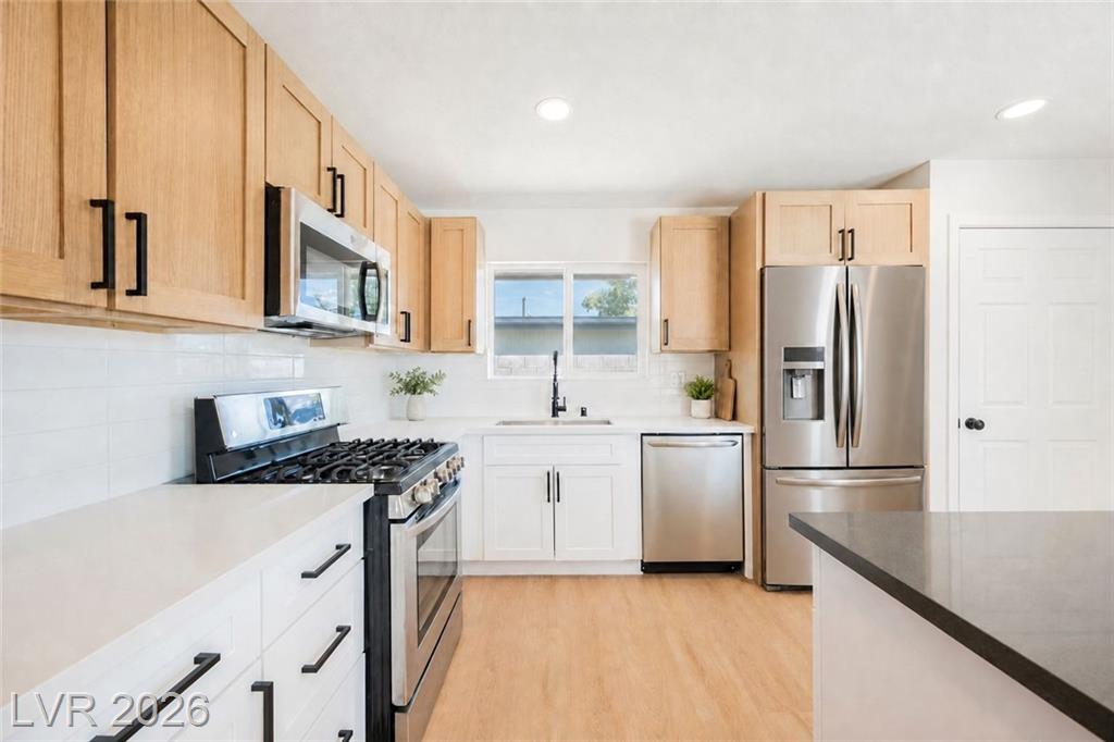 2454 Winterwood Boulevard, Las Vegas, NV 89142 — photo 1