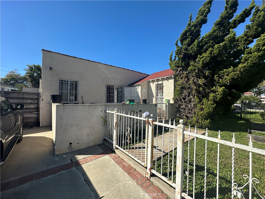 8725 S Denker, Los Angeles, CA 90047 — photo 1
