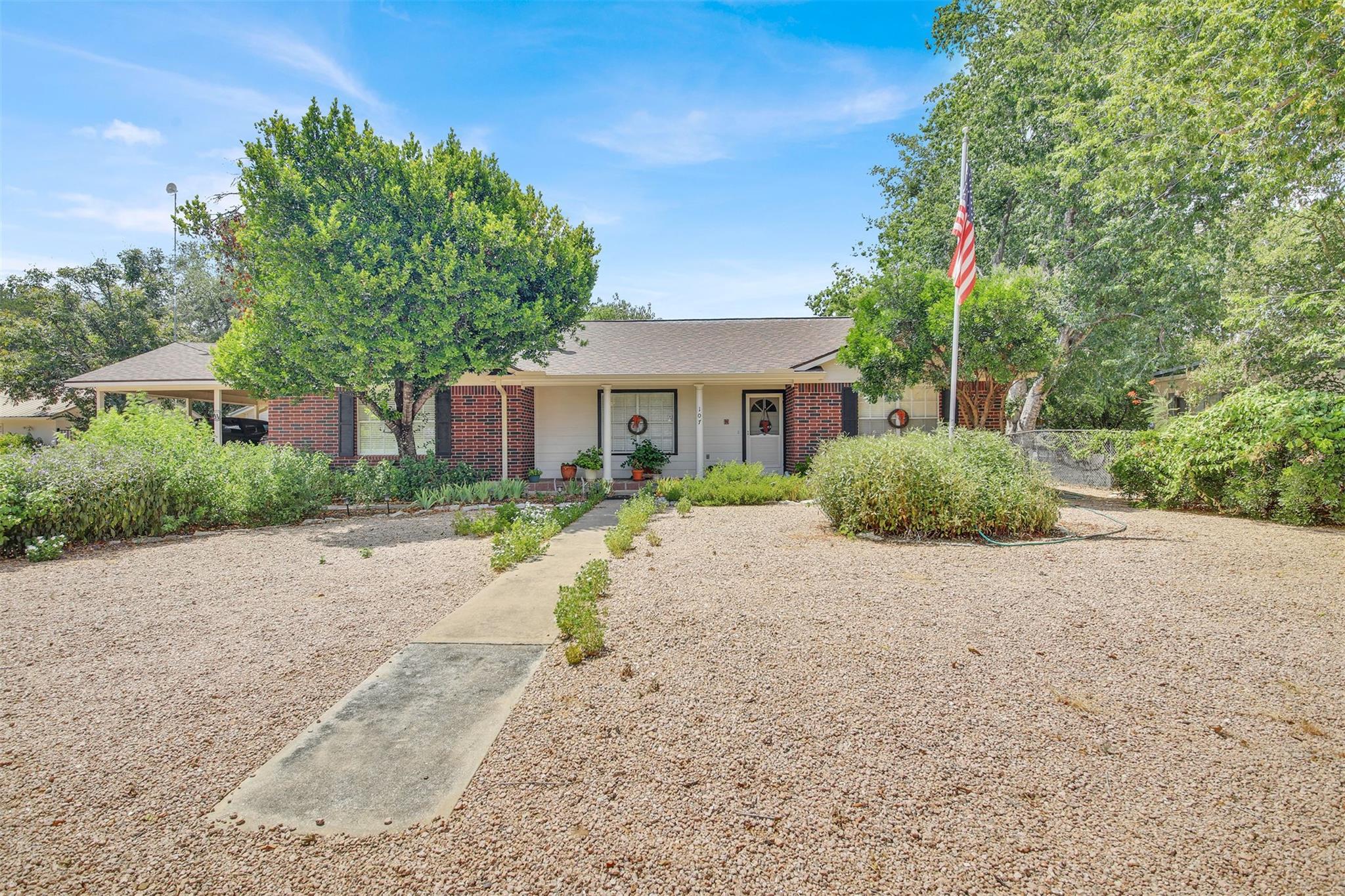 107  Taylor Dr, Spicewood, TX 78669 — photo 1